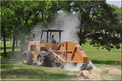 rock saw cutting Oak Wilt trenc